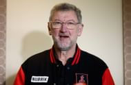 Simon Madden speaks with media during the Essendon and Carlton AFLW Media Opportunity at Windy Hill on October 26, 2023